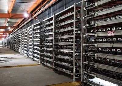 A modern mining farm showcasing advanced mining rigs in a secure environment